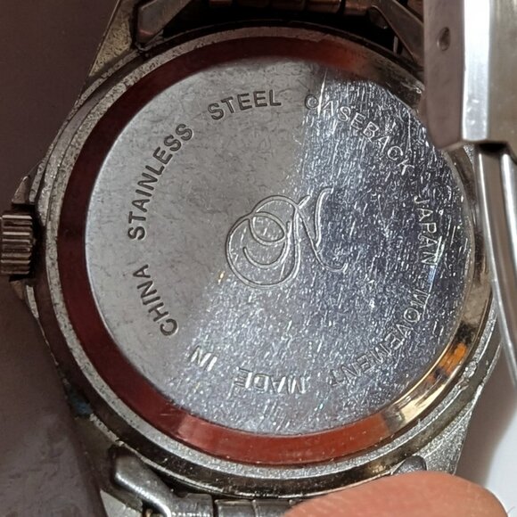 Simple stainless-steel quartz wristwatch with Japan movement and “N” logo dial. - Picture 3 of 3